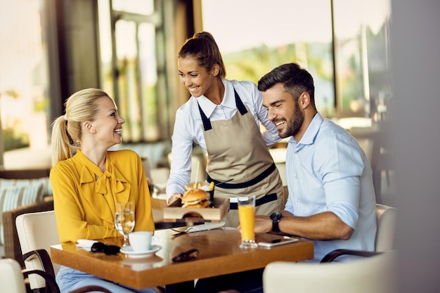 Waitress serving food